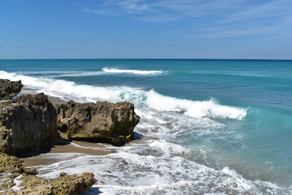 waves crashing into rocks